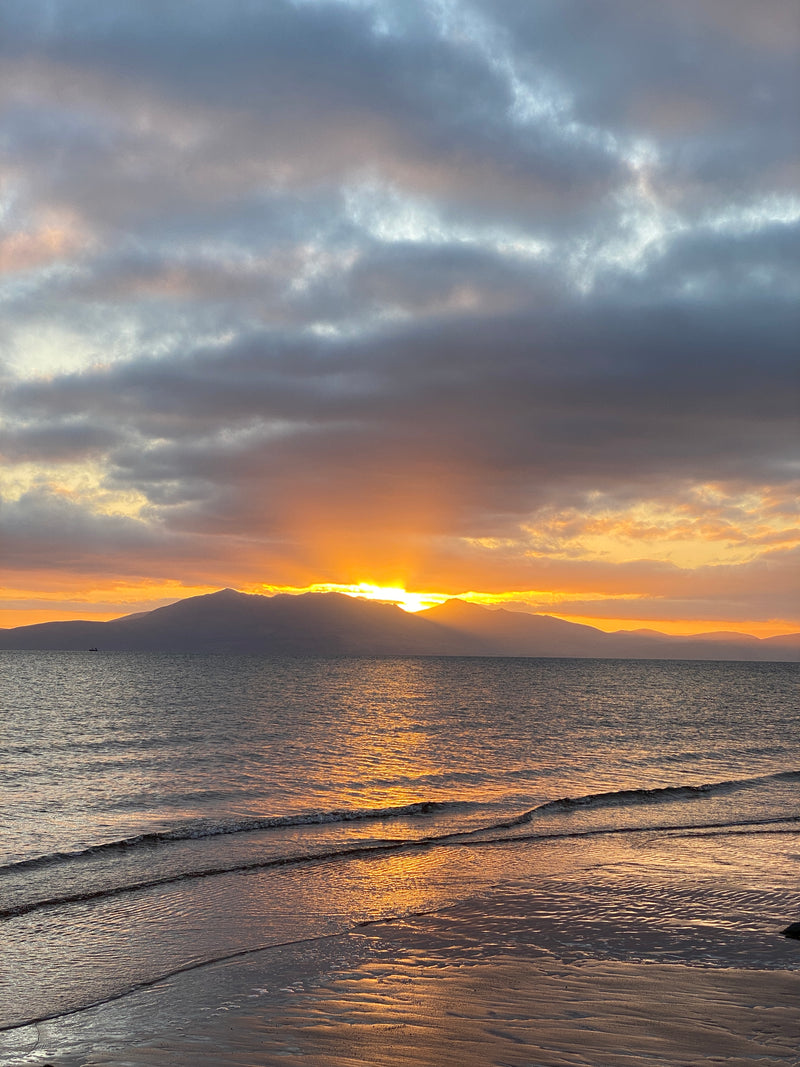 Load image into Gallery viewer, Sunset over the Isle of Arran. Photograph by Ange Sewell
